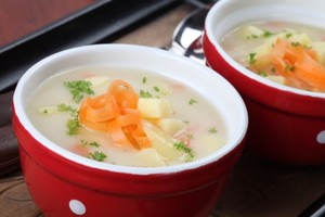 Two bowls of vegetable soup.