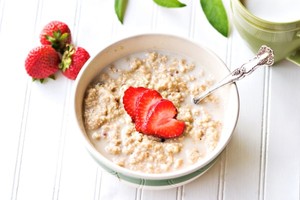 A bowl of strawberry oatmeal.